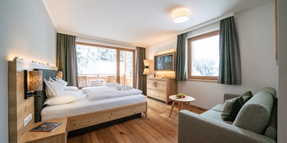Wellnessurlaub - Shiatsu Massage - Österreich - Premium Familienzimmer - Hotel GUT Trattlerhof & Chalets****