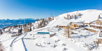 Wellnessurlaub - Shiatsu Massage - Österreich - Auf einem Hochplateau der Gerlitzen Alpe mit Blick über ganz Kärnten bietet der Feuerberg ein unvergleichliches Urlaubserlebnis inmitten der Natur. - Feuerberg Mountain Resort