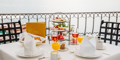 Wellnessurlaub - Bettgrößen: Queen Size Bett - Österreich - Schlossfrühstück auf unserer Sonnenterrasse - Hotel Schloss Seefels