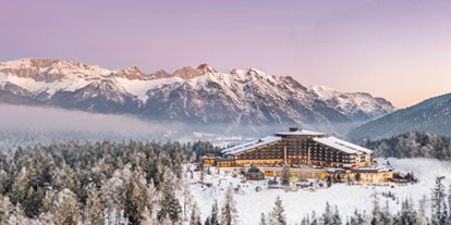 Wellnessurlaub - Zugspitze - Interalpen-Hotel Tyrol im Winter in der Vogelperspektive - Interalpen-Hotel Tyrol