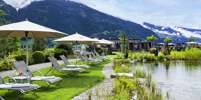 Wellnessurlaub - Tirol - Garten mit Bio-Schwimmteich - Sport- und Wellnesshotel Held****s