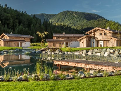 Wellnessurlaub - Umgebungsschwerpunkt: See - Chaletdorf auf Gut Steinbach mit Naturschwimmteich - Gut Steinbach Hotel und Chalets