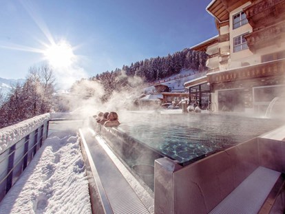Wellnessurlaub - Pools: Infinity Pool - 32° Outdoorpool - Alpin Family Resort Seetal****s