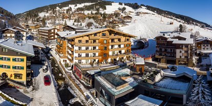 Wellnessurlaub - Skilift - Österreich - Außenansicht Winter - Hotel Kendler