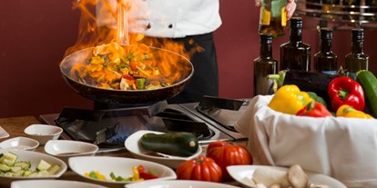 Wellnessurlaub - Burgenland - Kochen auf offener Flamme im Restaurant im Hotel Larimar - Hotel Larimar