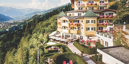 Wellnessurlaub - Hotel-Schwerpunkt: Wellness & Romantik - Österreich - Hotelansicht Sommer  - Hotel AlpenSchlössl