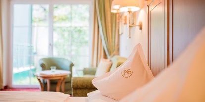 Wellnessurlaub - Schokoladenmassage - Österreich - Komfortabel eingerichtete Zimmern und Suiten wohlfühlen. - Hotel AlpenSchlössl