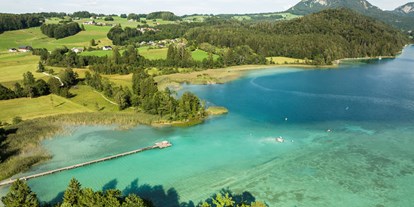 Wellnessurlaub - Sbg. Salzkammergut - Blick auf den kristallblauen Fuschlsee - Arabella Jagdhof Resort am Fuschlsee