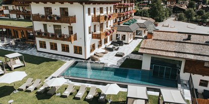 Wellnessurlaub - Pools: Infinity Pool - Ramsau am Dachstein - Hotel Tauernhof 