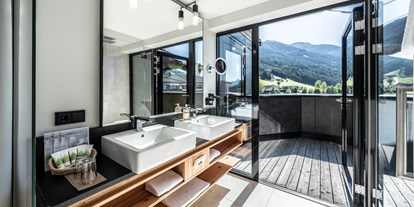 Wellnessurlaub - Finnische Sauna - Lavant - Wohnbeispiel Premium Suite de Luxe  - Dolomiten Residenz Sporthotel Sillian