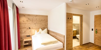 Wellnessurlaub - Ganzkörpermassage - Kirchberg in Tirol - Einzelzimmer - Ferienhotel Sonnenhof****S