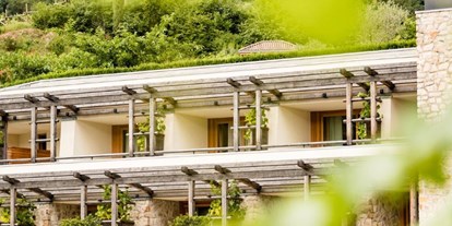 Wellnessurlaub - Preisniveau: gehoben - Commezzadura Val di Sole - Hotel Hasslhof - Wohnen im Weinberg am Kalterer See