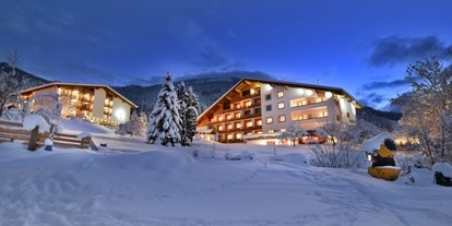 Wellnessurlaub - Whirlpool - Kärnten - Hotel NockResort in winterlichen Ambiente - Hotel NockResort
