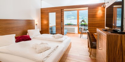 Wellnessurlaub - Hotel-Schwerpunkt: Wellness & Skifahren - Presseggersee - Familienzimmer - Hotel NockResort