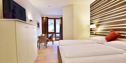 Wellnessurlaub - Wirbelsäulenmassage - Seeboden - Familienzimmer - Hotel NockResort