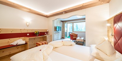 Wellnessurlaub - Bettgrößen: Doppelbett - Seeboden - Junior Suite Zirbe - Hotel Pulverer