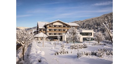 Wellnessurlaub - Finnische Sauna - Flachau - design & wellness Hotel Alpenhof ****S im Winter - Design & Wellness Hotel Alpenhof