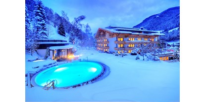 Wellnessurlaub - Salzburg - Winter Hotelansicht - Gartenhotel Theresia****S - das "grüne", authentische Hotel.