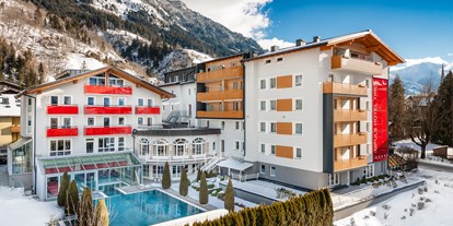 Wellnessurlaub - Hotel-Schwerpunkt: Wellness & Skifahren - Radstadt - Aussenansicht Winter - Impuls Hotel Tirol