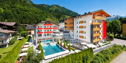 Wellnessurlaub - Umgebungsschwerpunkt: Berg - Lienz (Lienz) - Aussenansicht Sommer - Impuls Hotel Tirol