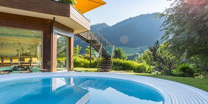 Wellnessurlaub - Ayurveda-Therapie - Bürserberg - Außenwhirlpool - Alpenhotel Oberstdorf