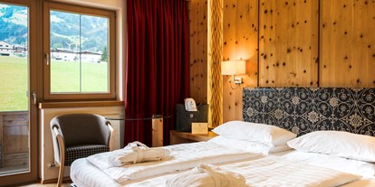 Wellnessurlaub - Hotel-Schwerpunkt: Wellness & Skifahren - Kitzbühel - Familien Suite Zirbe - Sport- und Wellnesshotel Held****s