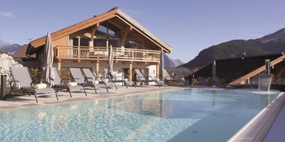 Wellnessurlaub - Klassifizierung: 4 Sterne - Bad Kohlgrub - Außenpool - Mountains Hotel