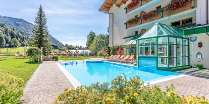 Wellnessurlaub - Hotel-Schwerpunkt: Wellness & Sport - Erpfendorf - Freibad - Vitalhotel Berghof