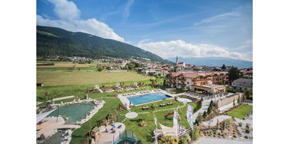 Wellnessurlaub - Pools: Schwimmteich - Mayrhofen (Mayrhofen) - Hotel Sonnenhof