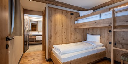 Wellnessurlaub - Hotel-Schwerpunkt: Wellness & Natur - Davos Platz - Familienzimmer - Kinderzimmer - Alpenresort Fluchthorn