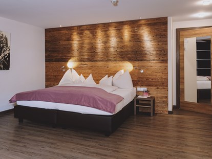 Wellnessurlaub - Hotel-Schwerpunkt: Wellness & Skifahren - Pinzgau - Zimmer - ALL INCLUSIVE Hotel DIE SONNE