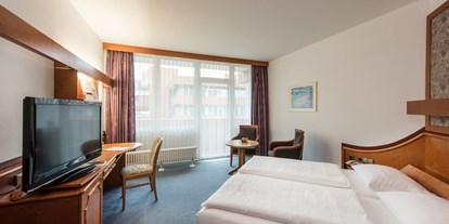 Wellnessurlaub - Finnische Sauna - Oberaula - Zimmerbeispiel Standard-Doppelzimmer im Gästehaus - Göbel's Hotel Rodenberg