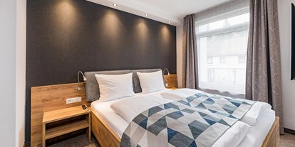 Wellnessurlaub - Hotel-Schwerpunkt: Wellness & Familie - Bad Sachsa - Zimmerbeispiel Komfort-Plus-Zimmer - Göbel's Vital Hotel