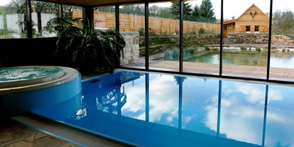 Wellnessurlaub - Hotel-Schwerpunkt: Wellness & Romantik - Deutschland - Schwimmbad mit Whirlpool - Hotel Hammermühle
