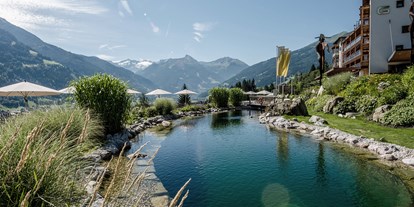 Wellnessurlaub - Hotel-Schwerpunkt: Wellness & Wandern - Katschberghöhe - Naturbadeteich DAS.GOLDBERG - Das Goldberg