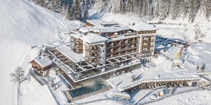 Wellnessurlaub - Hotel-Schwerpunkt: Wellness & Skifahren - Pinzgau - DAS.GOLDBERG Winter direkt an der Piste - Das Goldberg