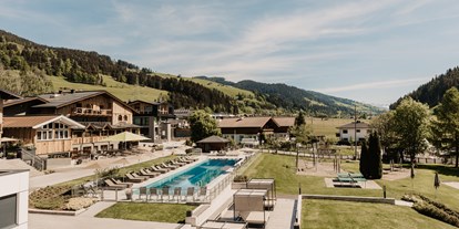 Wellnessurlaub - Pools: Infinity Pool - Haus (Haus) - Sportbecken - Hofgut Apartment & Lifestyle Resort Wagrain