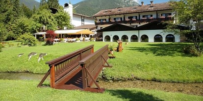Wellnessurlaub - Hotel-Schwerpunkt: Wellness & Kulinarik - Zugspitz Region - Alpenhof Grainau mit Garten - Alpenhof Grainau